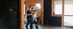Two people reviewing home renovations, representing how a home equity loan or cash-out refinance can help fund home improvements and other major expenses.