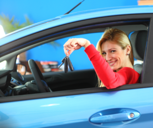 Holding New Car Keys after an auto loan at Northwoods CU