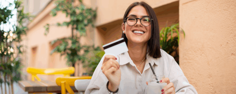 Woman using credit card with northwoods credit union