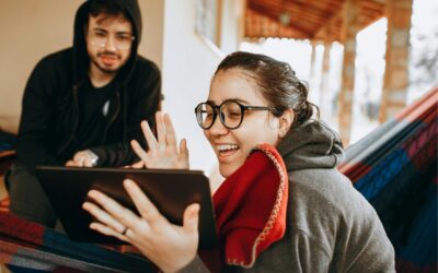Young Couple At Home Share Savings Account